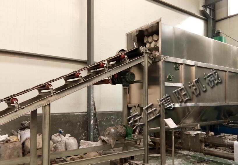 石灰石粉自動(dòng)拆包機(jī)是怎么達(dá)到無(wú)塵拆袋作業(yè)的？